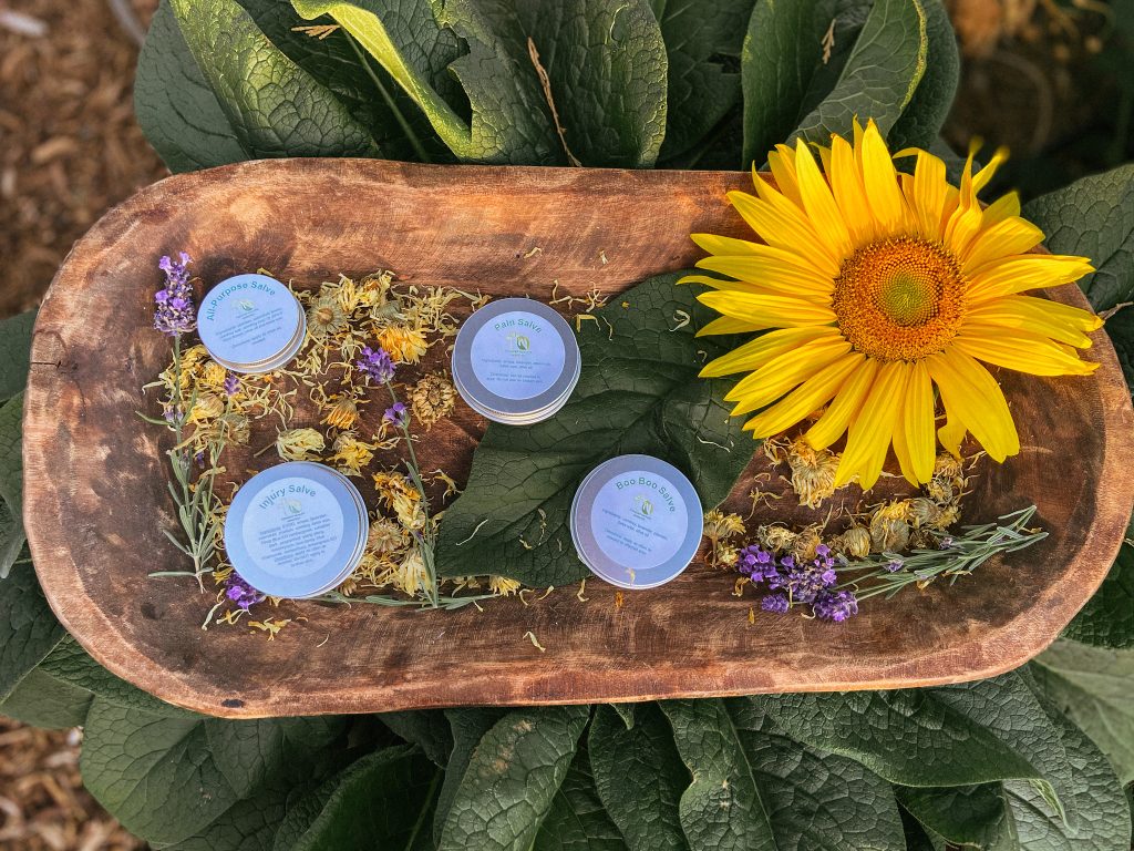 herbal salves with comfrey leaf calendula and lavender flowers sunflower