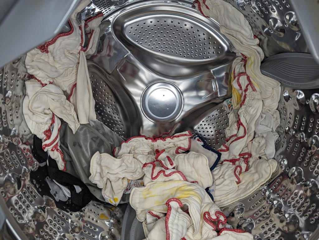 wet clean cloth diapers in washing machine