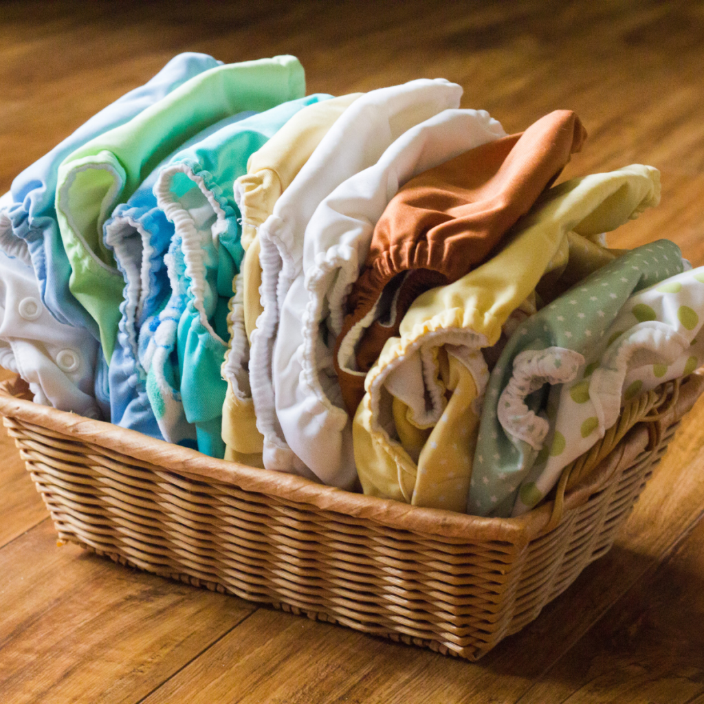 cloth diapers in wicker basket
