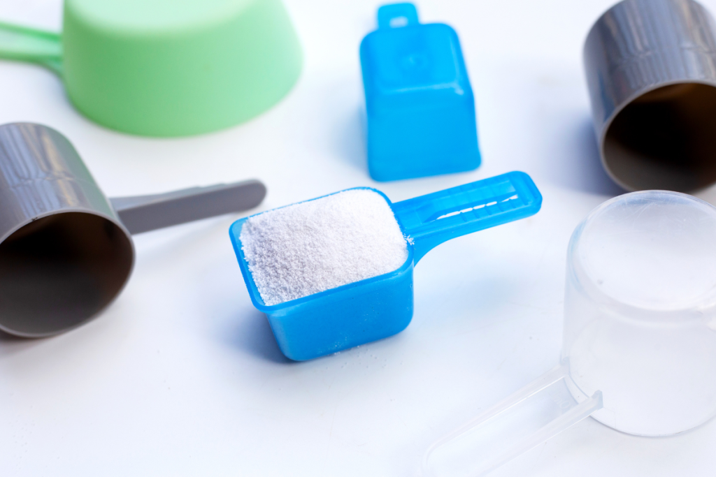 laundry detergent powder in measuring cups