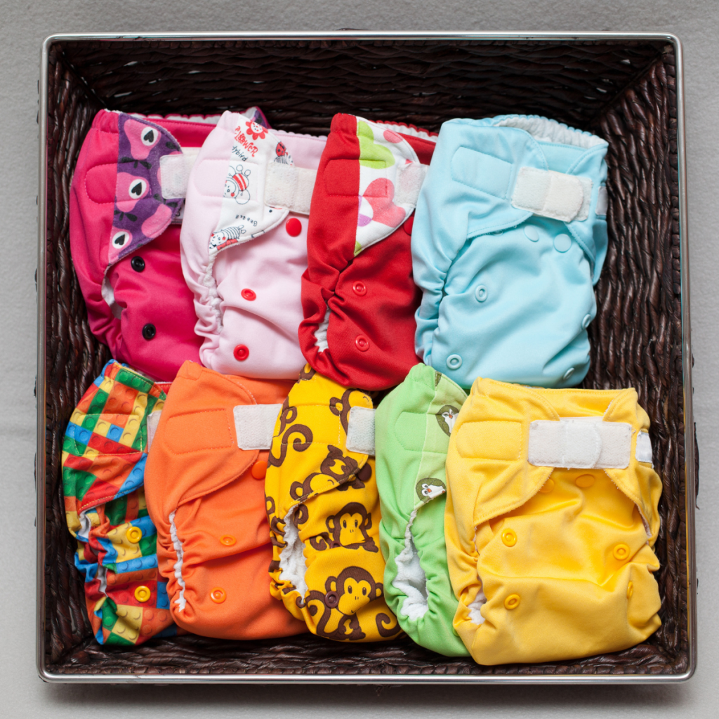 velcro cloth diapers in a basket