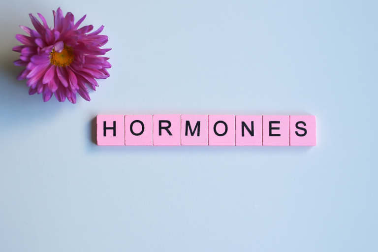 hormone letter tiles in pink and pink flower