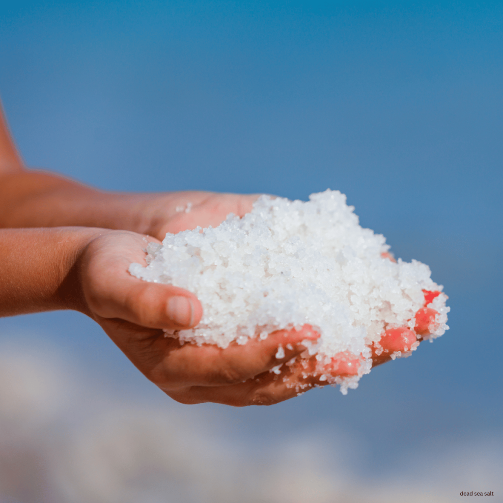 dead sea salt held in hands