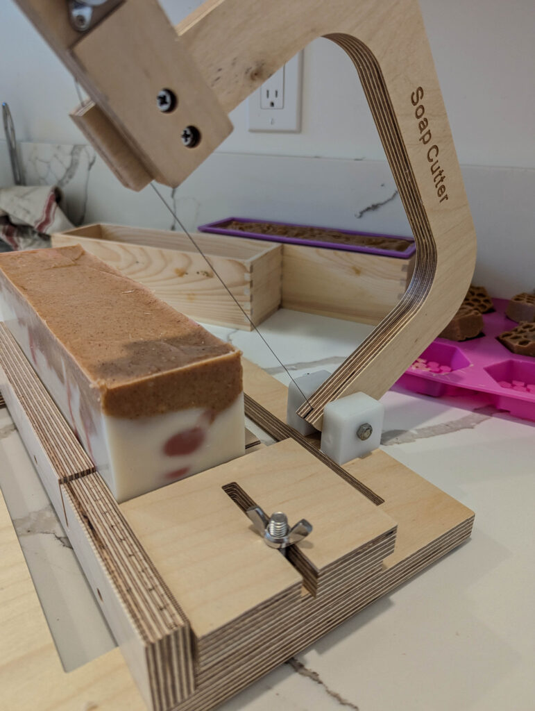 Cutting the herbal soap loaf to desired size