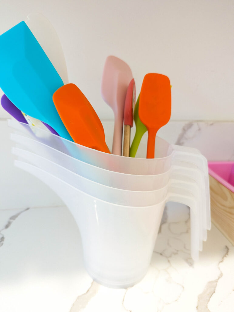 Different containers and spatulas 