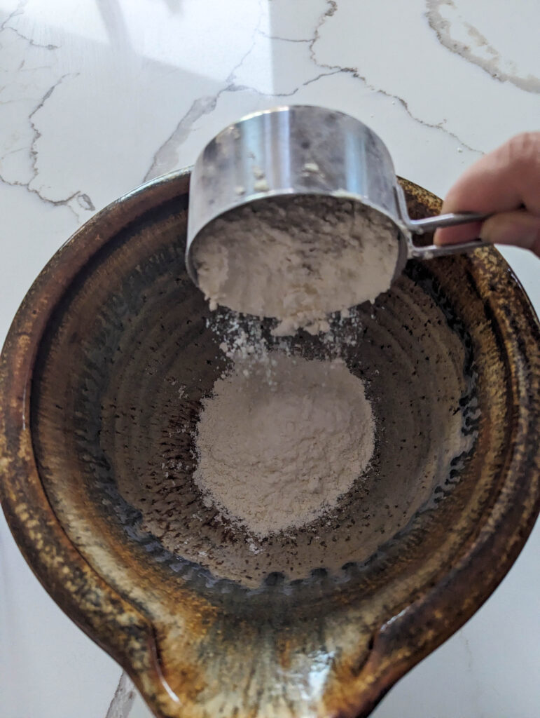 all purpose flour in a ceramic bowl