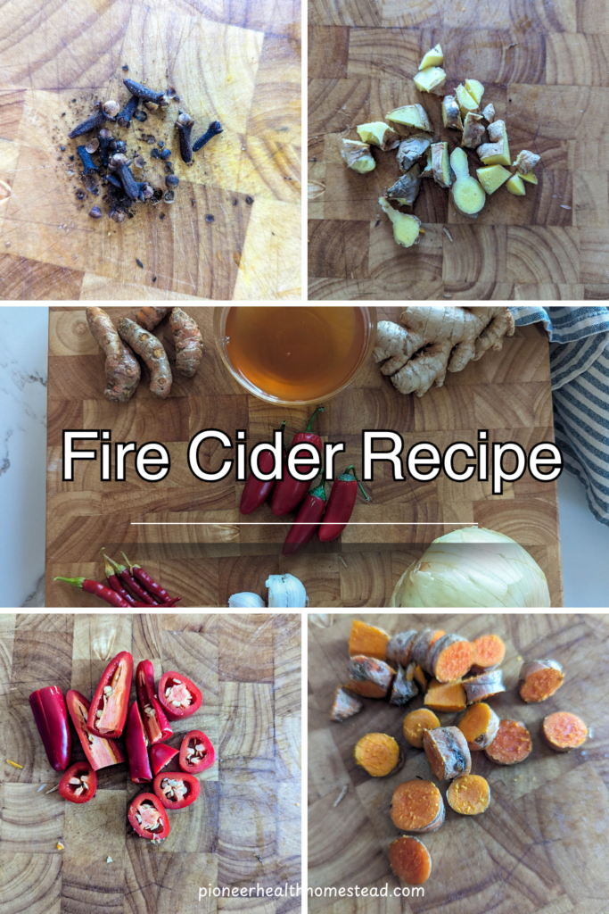 fire cider recipe with apple cider vinegar, turmeric root, ginger root, onion, garlic, cayenne peppers, jalapeno peppers on wood cutting board with white and blue towel