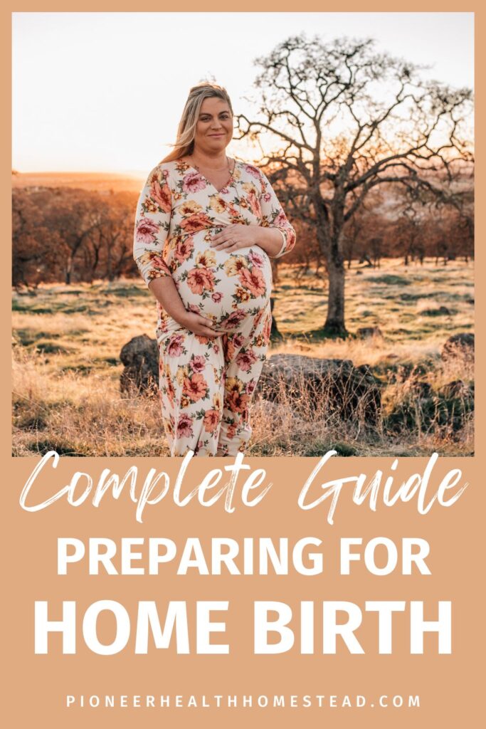 Pregnant woman with grass and a tree in a flower long dress