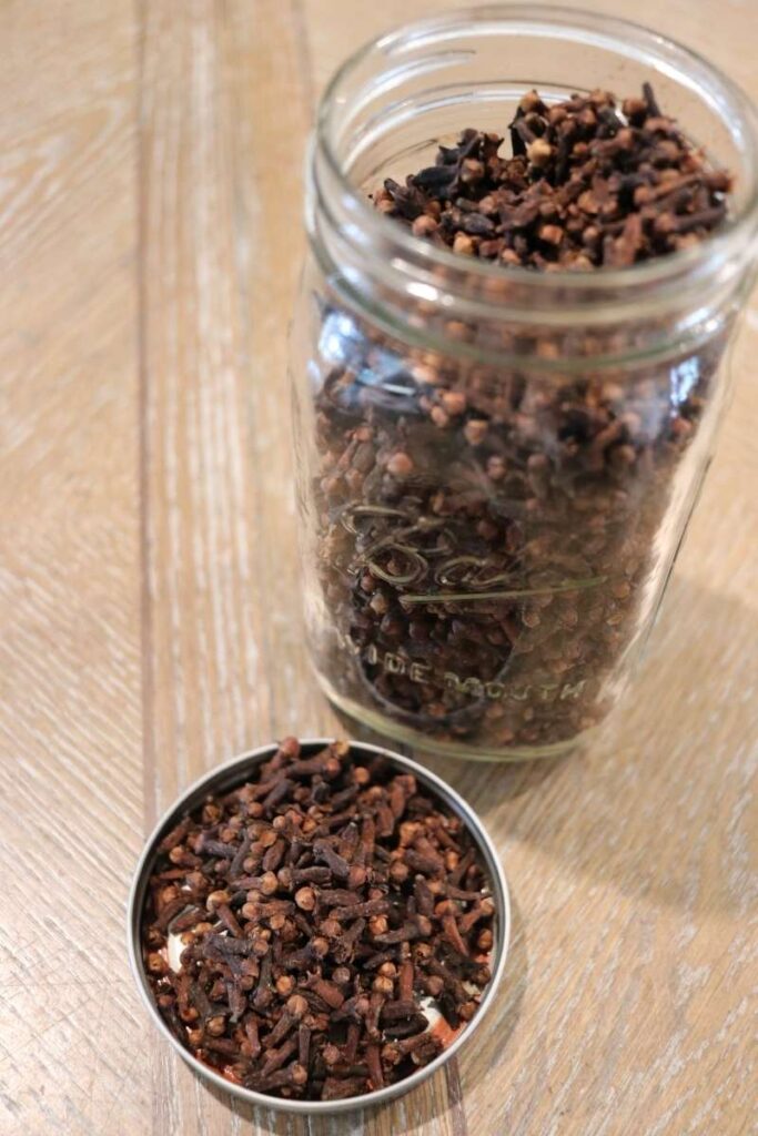 whole clove in mason jar and lid