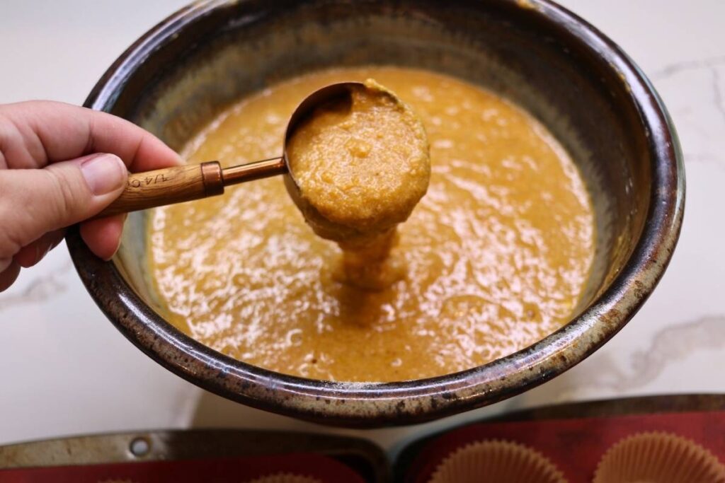 fresh ground flour muffin recipe pumpkin batter in bowl