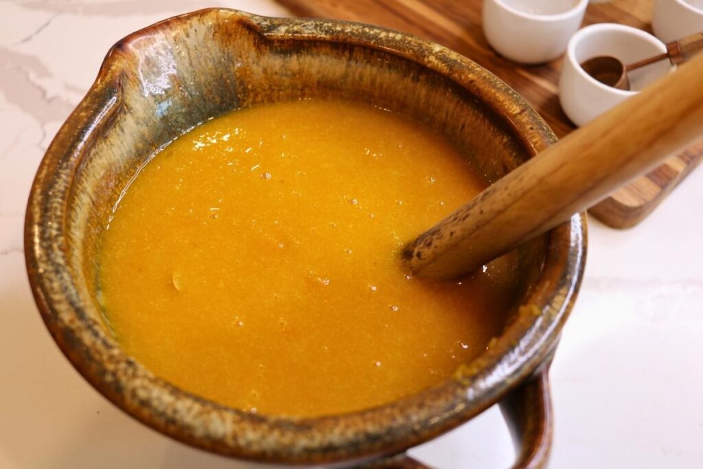 fresh ground flour muffin recipe pumpkin batter in bowl with mixer