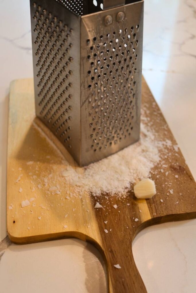 shredding castile soap on cheese grader