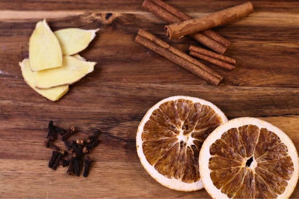 fresh ginger cloves dried orange slices cinnamon sticks