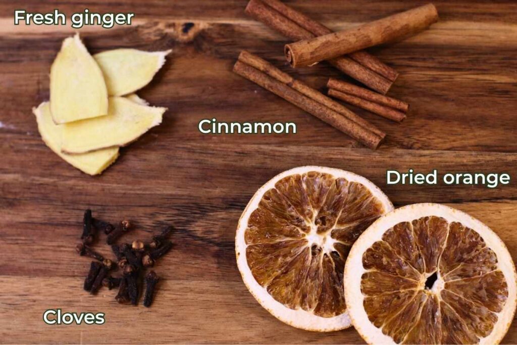 fresh ginger clove cinnamon sticks dried orange slices
