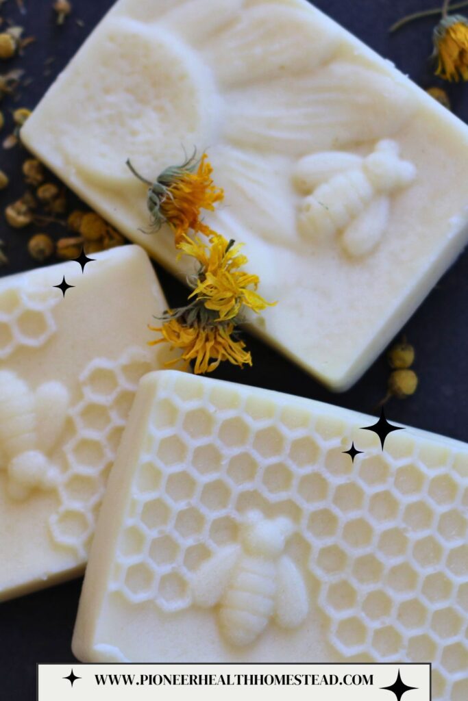 Easy Herbal Conditioner Bar Recipe with Chamomile & Calendula bars on slate tile